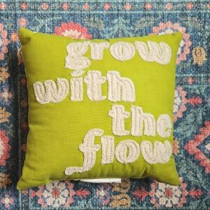 Green Decorative Pillow with Cream Text